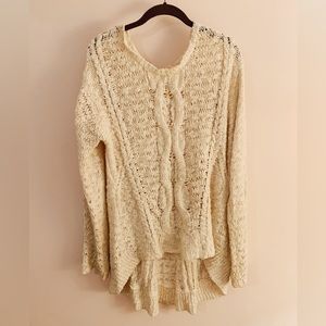 Anthropologie oversized cream sweater.